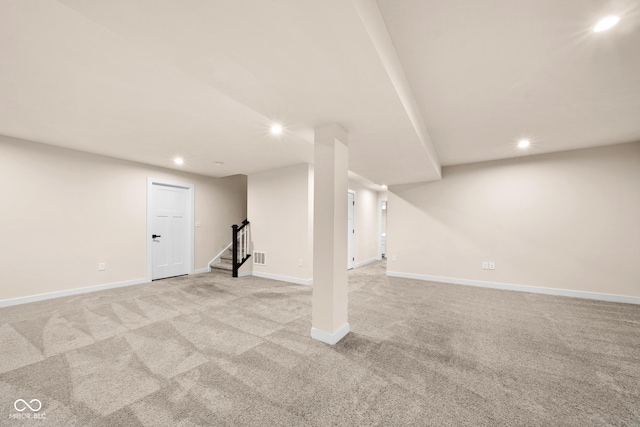 basement with light colored carpet