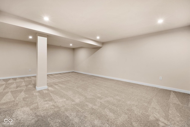 basement with light colored carpet