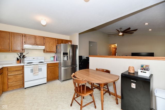 kitchen with electric stove, stainless steel fridge with ice dispenser, fridge, and ceiling fan