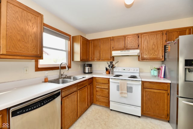 kitchen featuring stainless steel appliances and sink