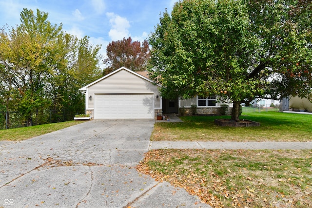 view of front of property featuring a front yard and a garage