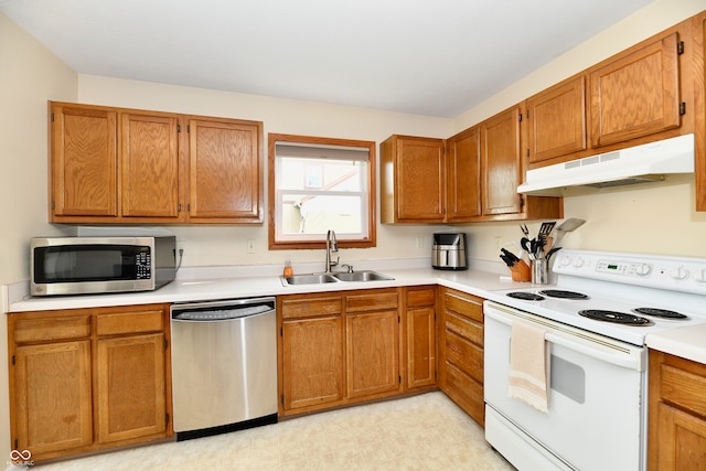 kitchen featuring appliances with stainless steel finishes and sink