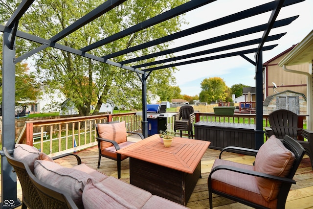 deck featuring a pergola and an outdoor living space