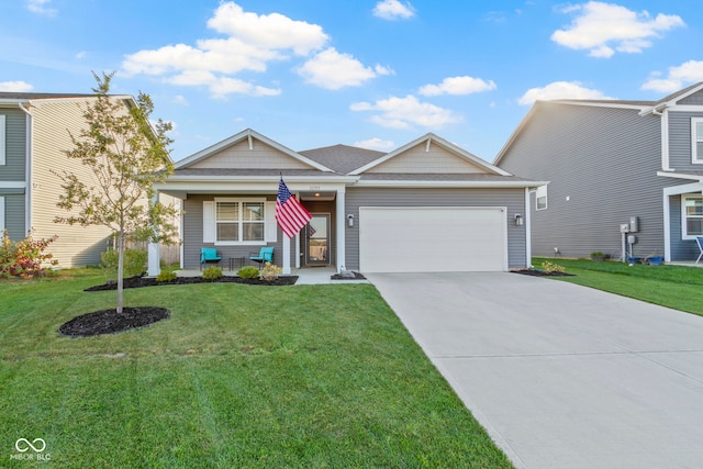 view of front facade featuring a front lawn and a garage