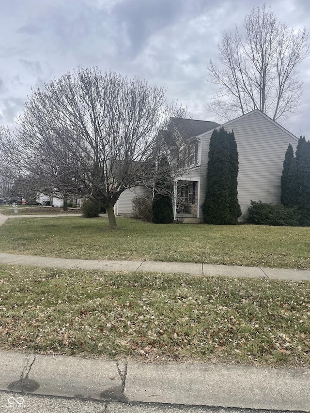 exterior space with a front lawn