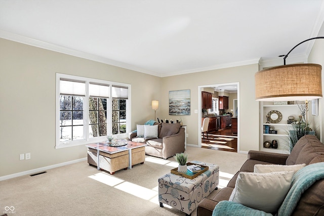 carpeted living room featuring built in shelves and ornamental molding