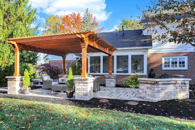 view of patio featuring a pergola