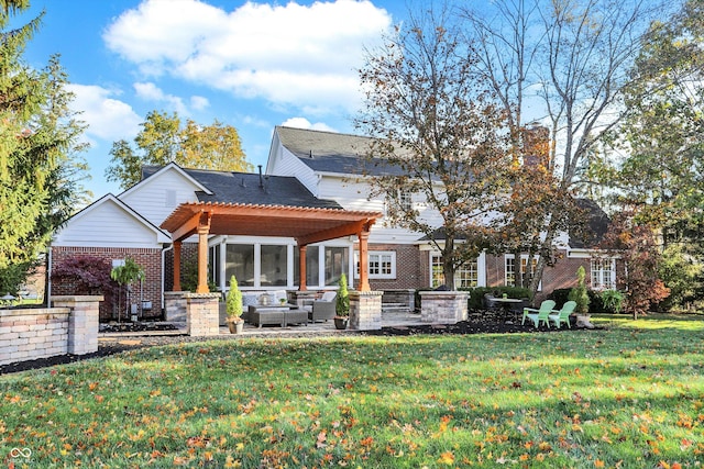 rear view of property featuring an outdoor living space, a yard, a patio area, and a pergola