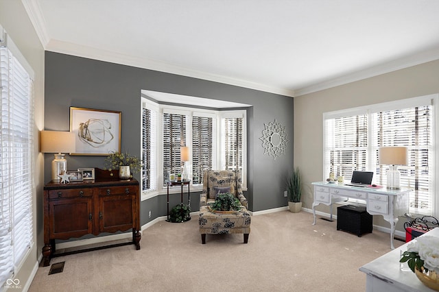 living area with ornamental molding and light carpet