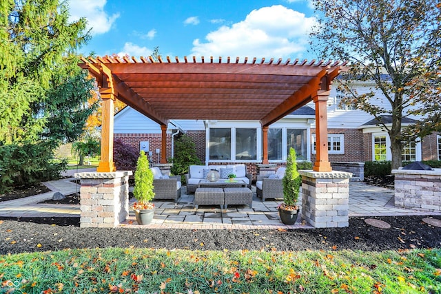 view of patio featuring an outdoor hangout area and a pergola