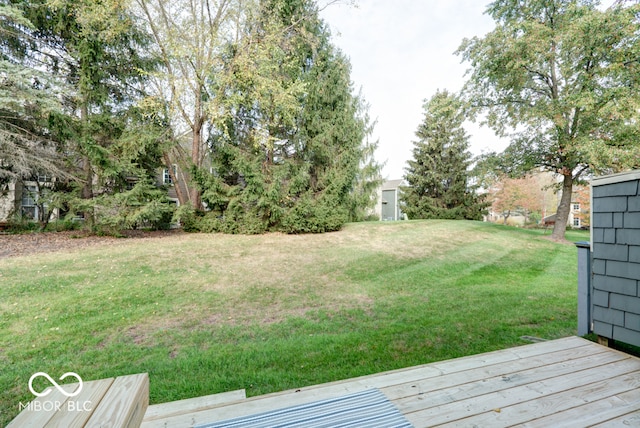 view of yard with a wooden deck