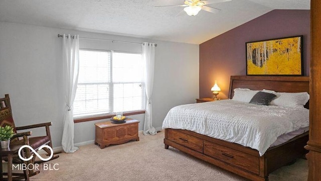 carpeted bedroom with ceiling fan, vaulted ceiling, and multiple windows