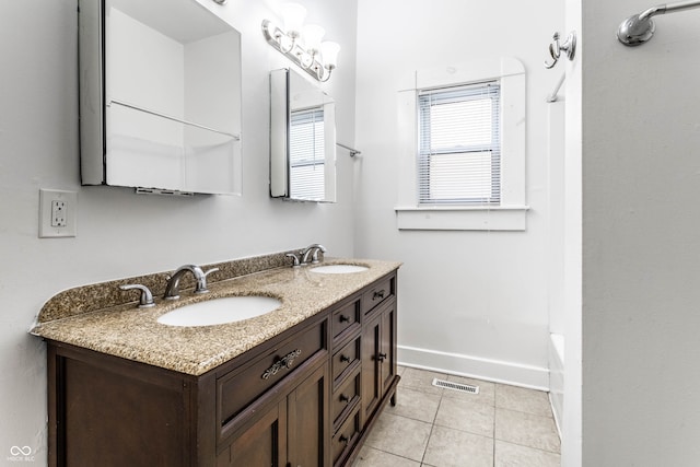 bathroom featuring vanity and tile patterned flooring