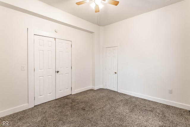 unfurnished bedroom featuring a closet, carpet floors, and ceiling fan