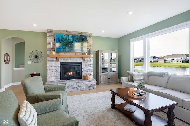 living room featuring a fireplace and hardwood / wood-style flooring