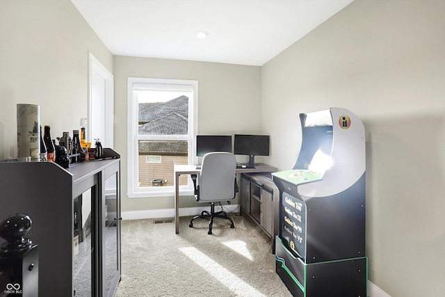 home office with light colored carpet