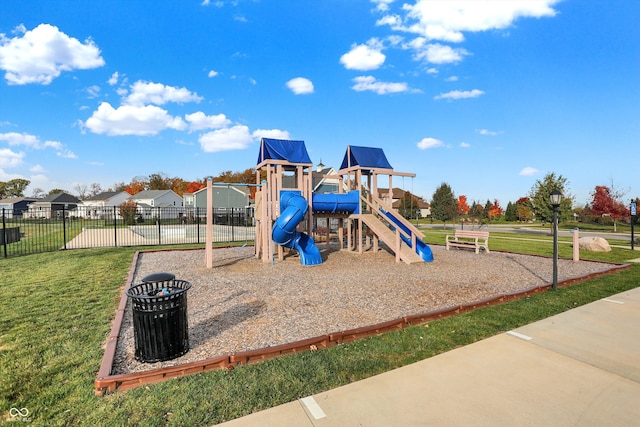 view of play area featuring a lawn