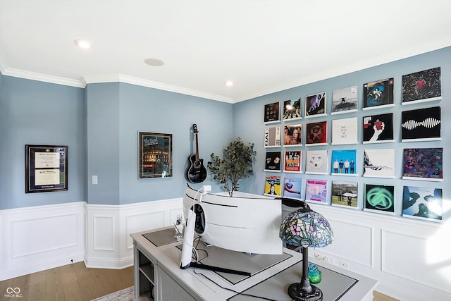 office space featuring hardwood / wood-style flooring and crown molding