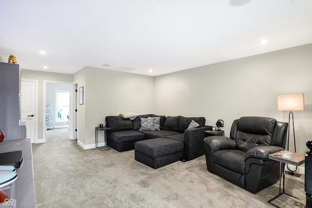 living room with light colored carpet