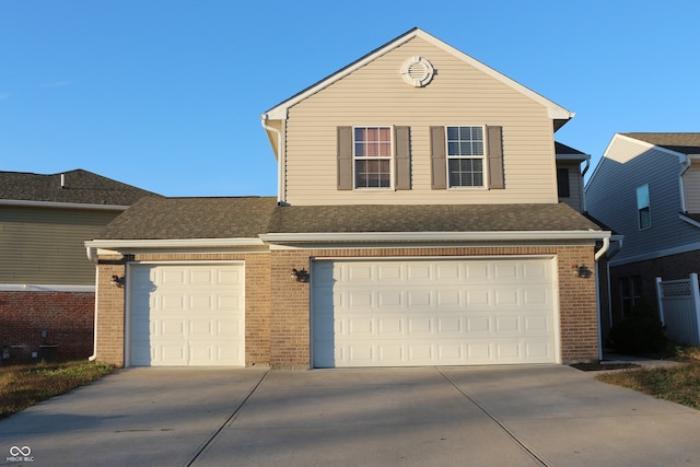 view of property with a garage