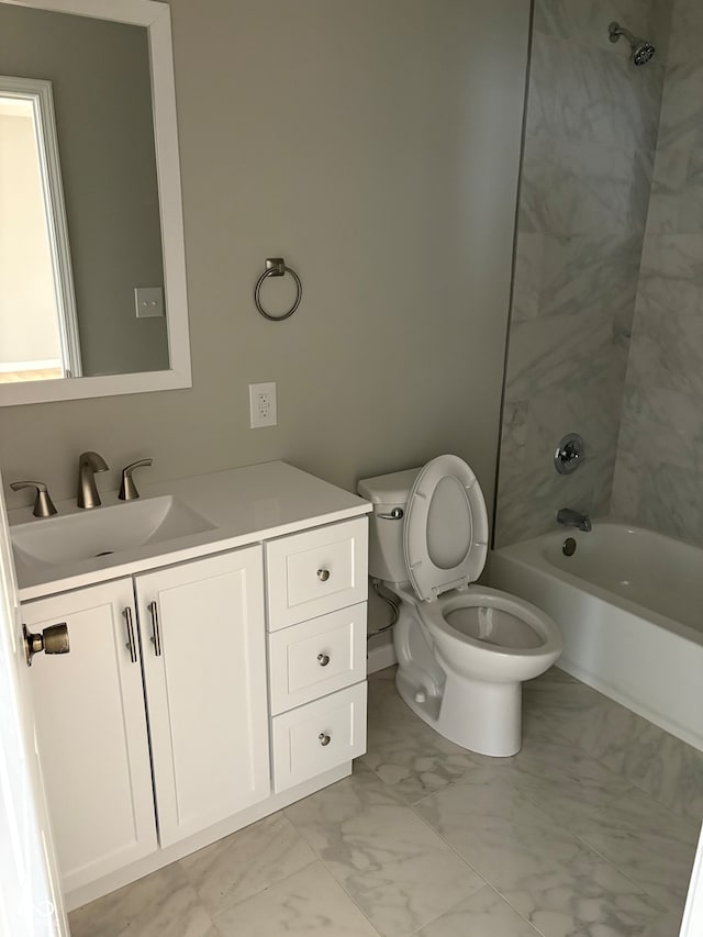 full bathroom with toilet, tiled shower / bath combo, and vanity