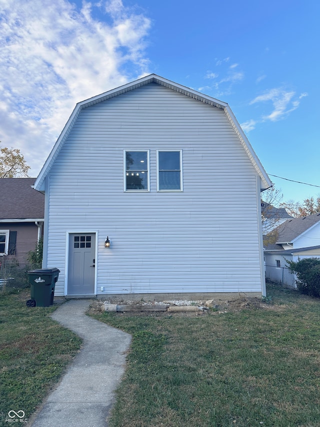 view of property exterior featuring a yard