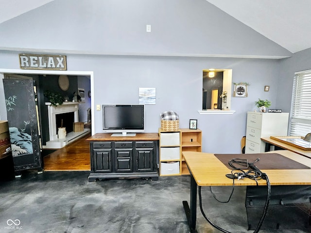 living room with high vaulted ceiling