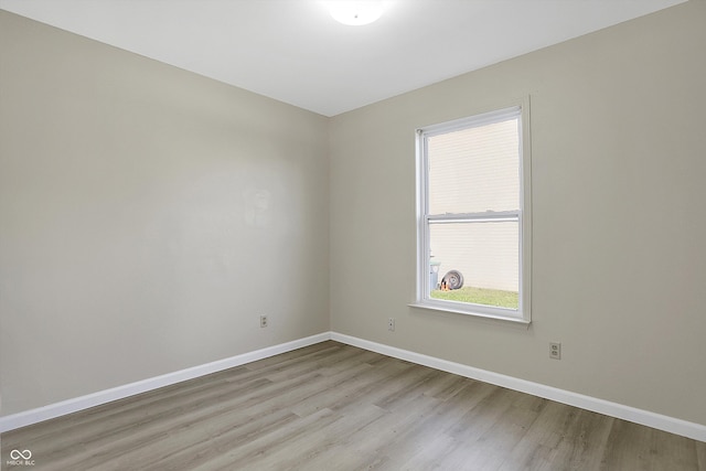 unfurnished room featuring light wood-type flooring