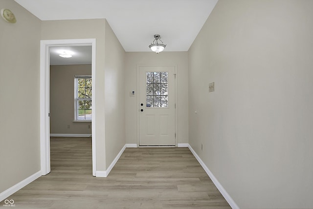 entryway with light hardwood / wood-style flooring