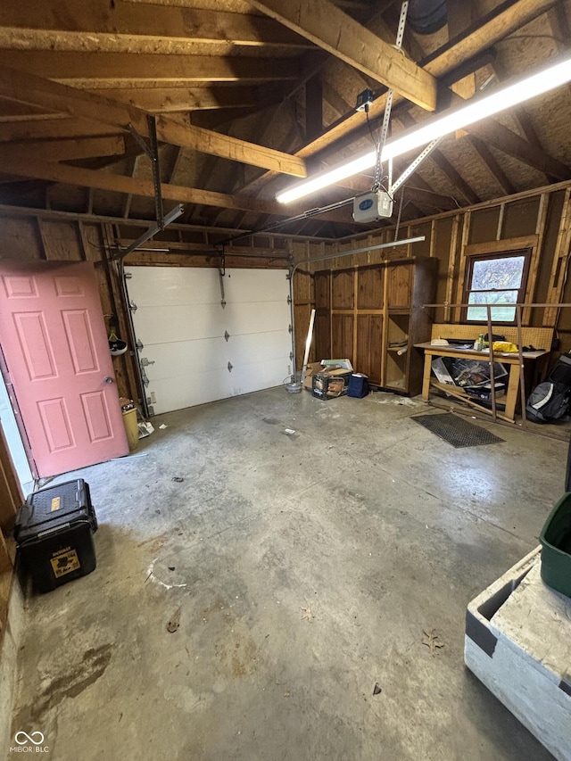 garage featuring a garage door opener