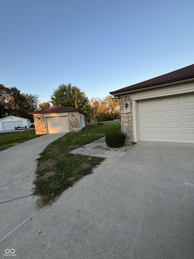 view of home's exterior with an outdoor structure