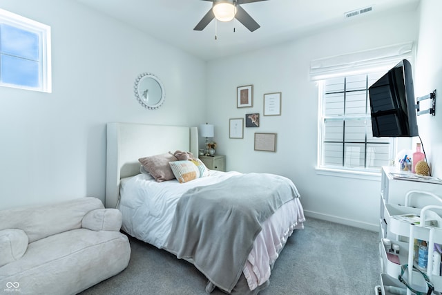 carpeted bedroom with ceiling fan