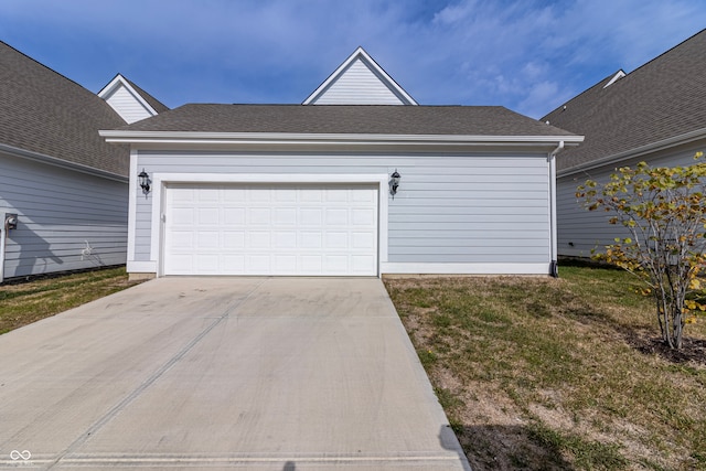 garage featuring a yard