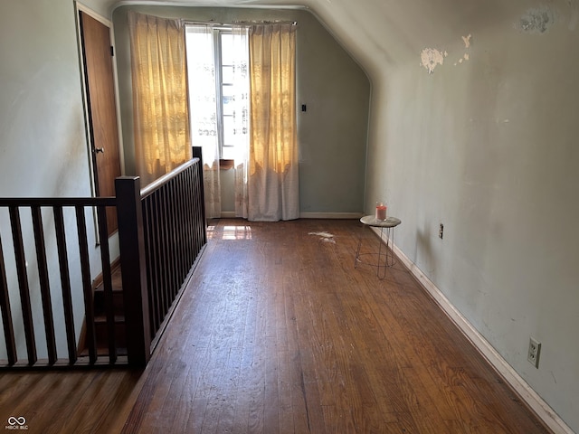 3305 N Keystone Ave, Indianapolis, IN 46218 - additional living space featuring wood-type flooring and vaulted ceiling
