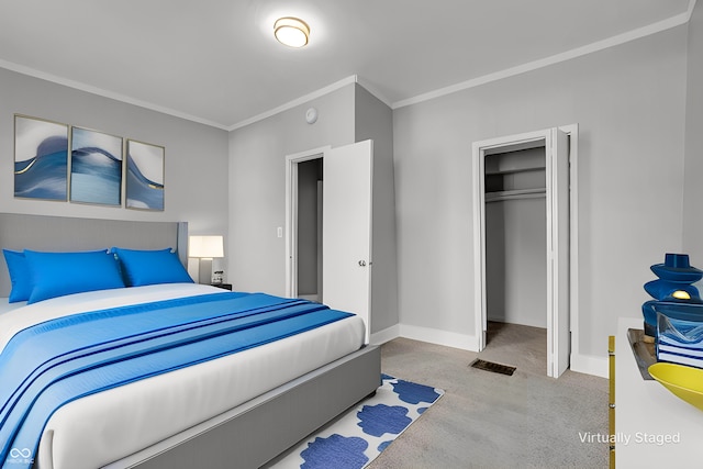 carpeted bedroom featuring crown molding and a closet