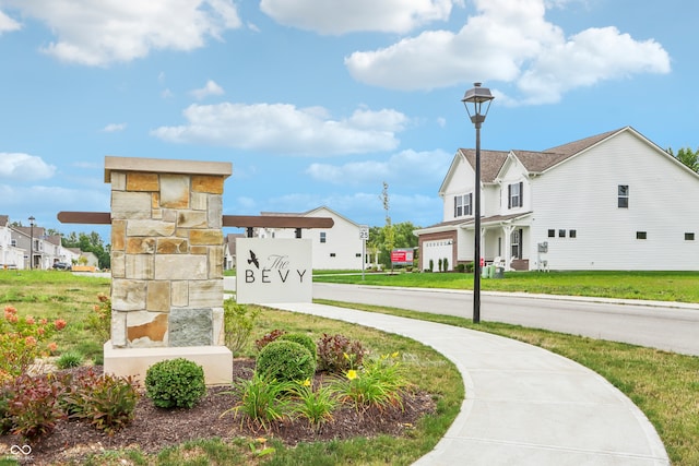 view of community with a lawn