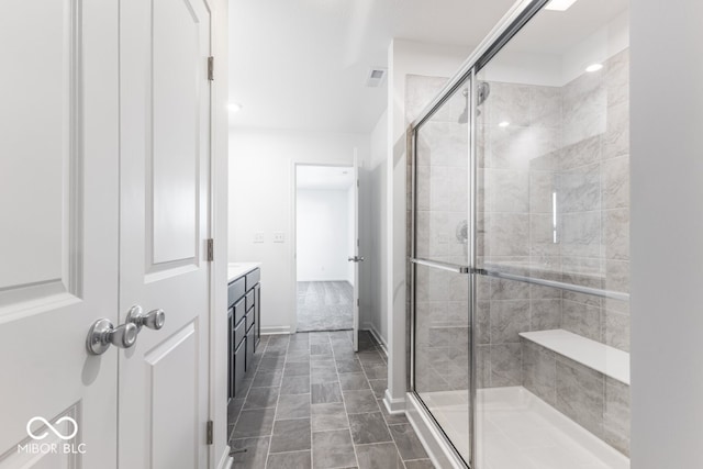 bathroom with vanity and walk in shower