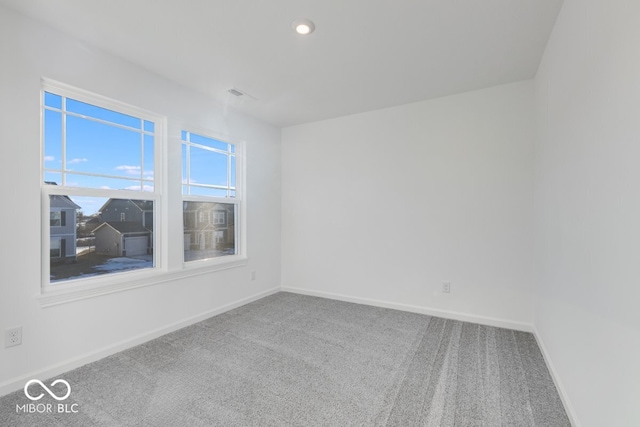 view of carpeted spare room