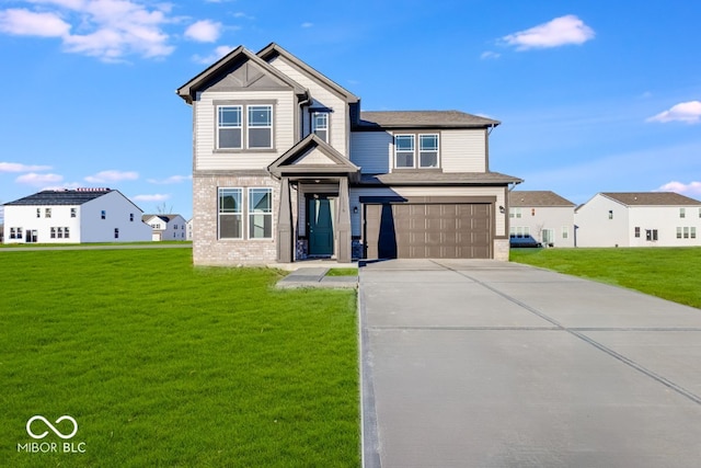 view of front of home featuring a garage and a front yard