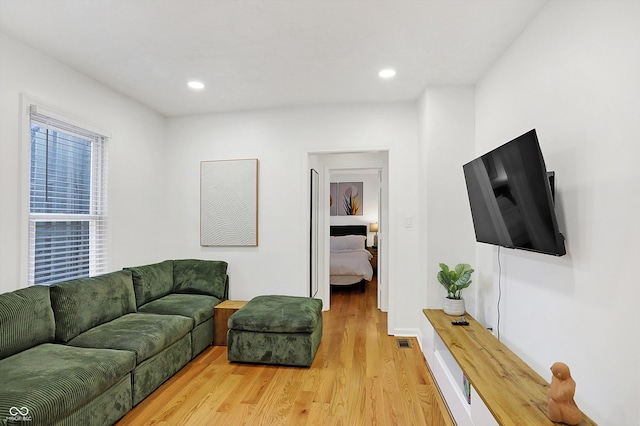 living room with light hardwood / wood-style floors