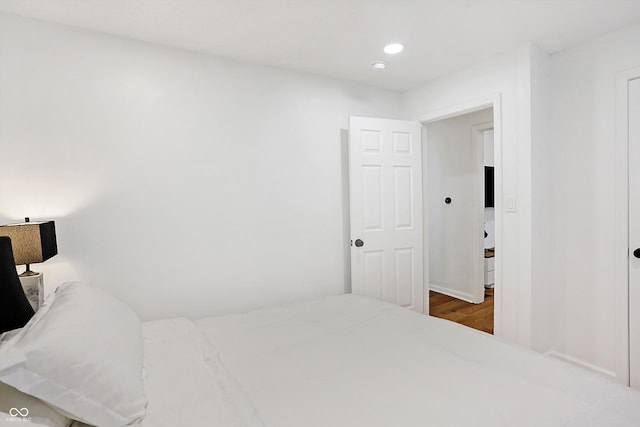 bedroom featuring hardwood / wood-style floors