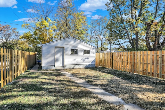 view of outdoor structure with a yard