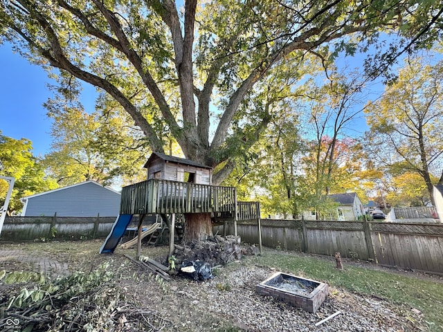 view of yard featuring a wooden deck