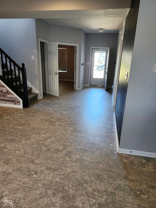 entrance foyer with a textured ceiling