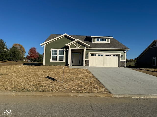 view of front of home with a garage