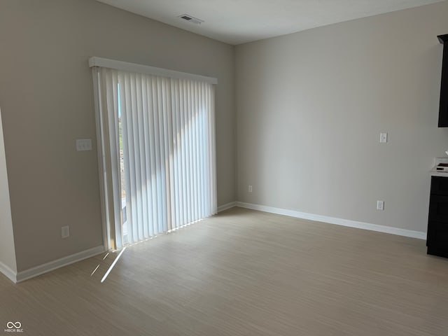 unfurnished living room featuring light hardwood / wood-style flooring