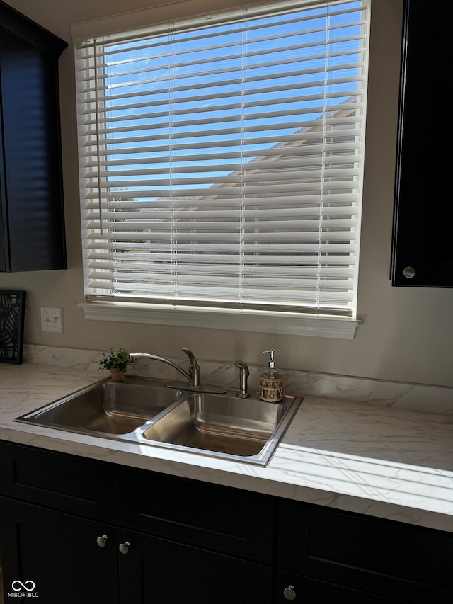 kitchen featuring sink and a wealth of natural light