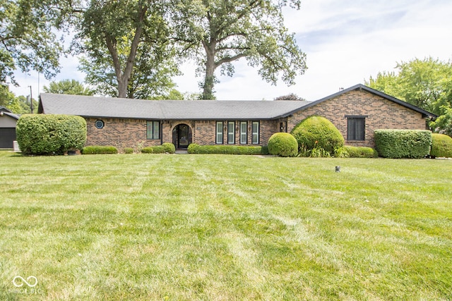 single story home with a front yard