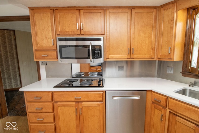 kitchen featuring stainless steel appliances and sink