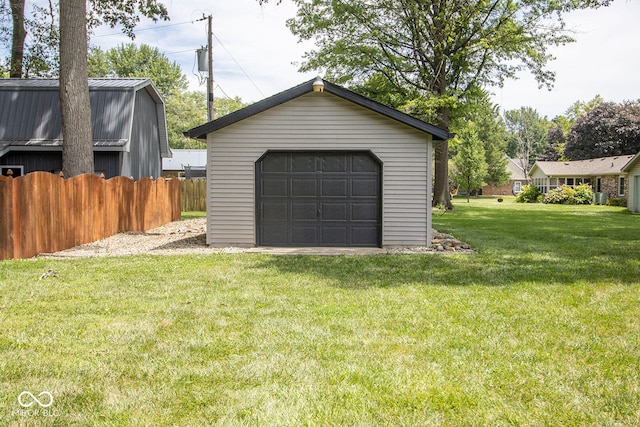 garage with a yard